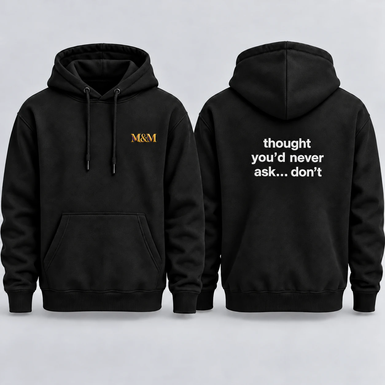 Black hoodie, front and back, with small M&M chest embroidery and the back saying: thought you’d never ask… don’t